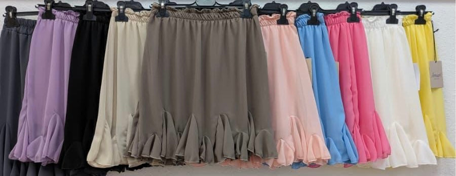 ￼ Plissierter Rock mit Volant Saum